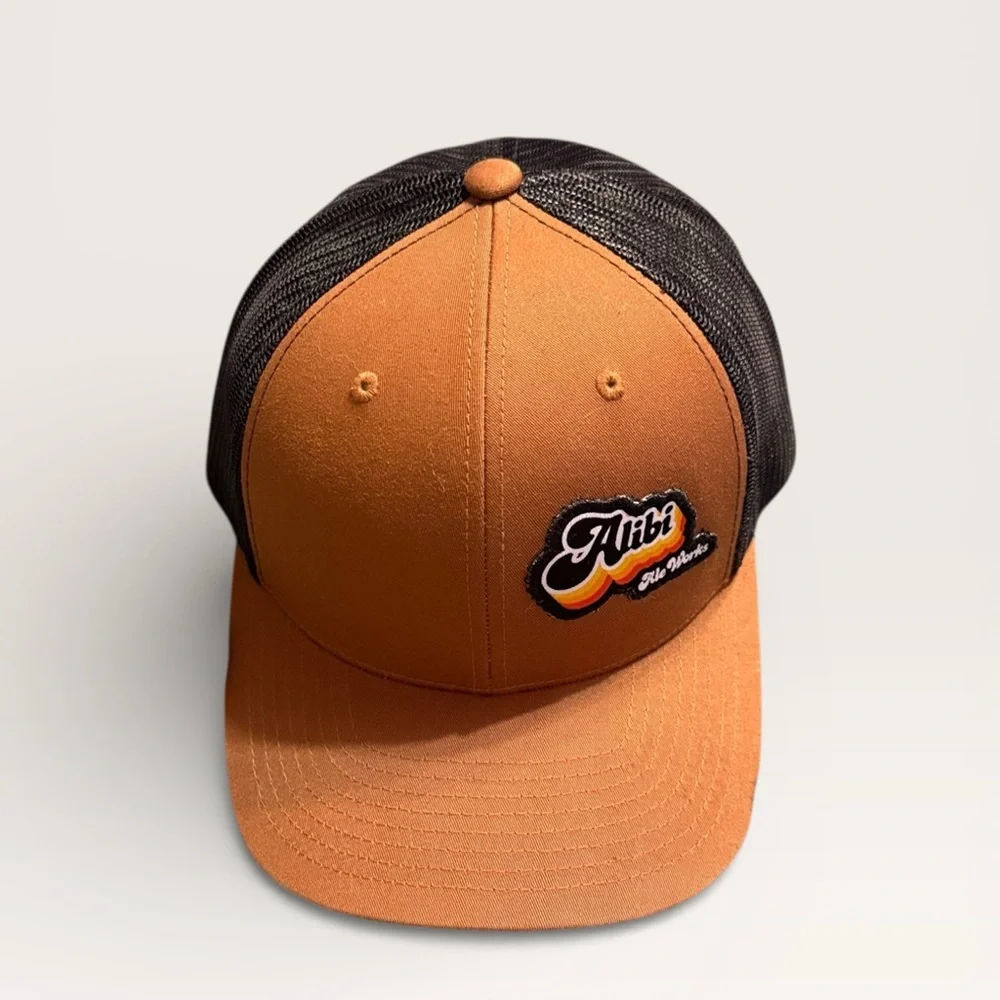 Alibi Ale Works Trucker Hat – Brown & Black Mesh (Adjustable)